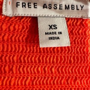 Orange Midi dress with pockets, salaried size XS